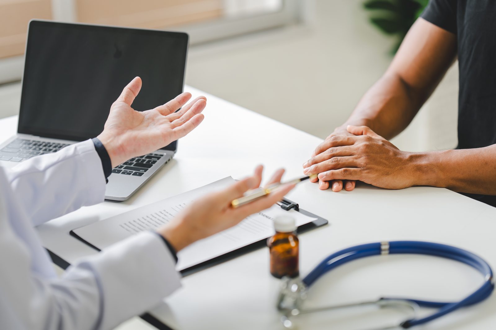 A physician discussing a treatment plan with a patient